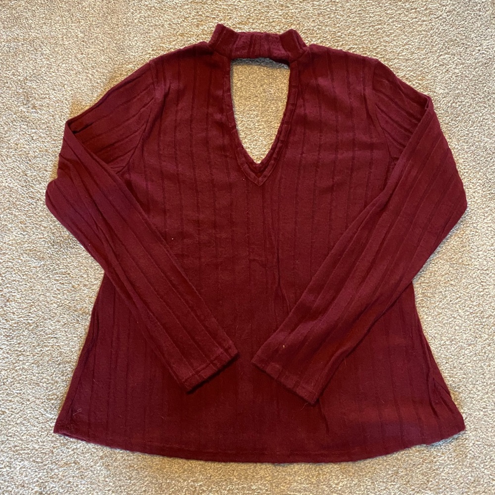 Turtle neck sweater with keyhole cutout